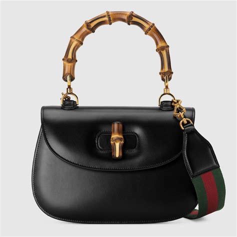 borsa gucci con manici in bamboo'|Collezione Gucci Bamboo 1947 .